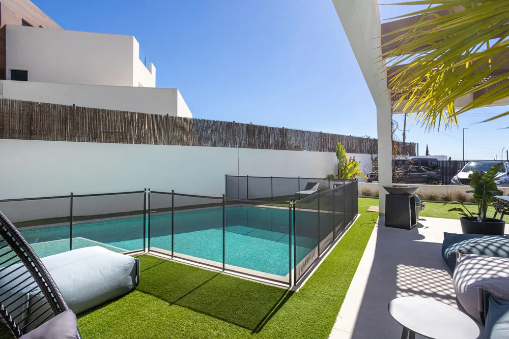 Modern compliant pool with safety fencing